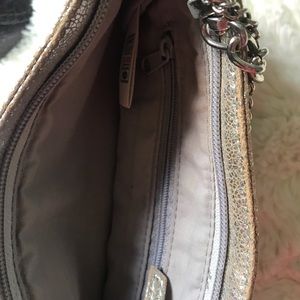 Silver clutch with chain detail